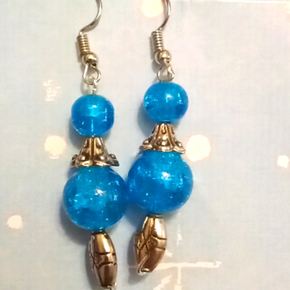 Blue and silver colored beaded earrings